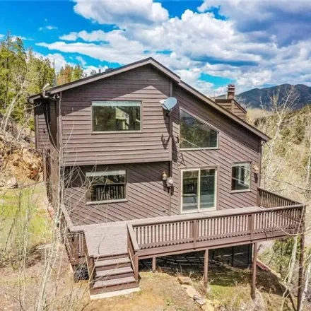 Buy this 3 bed house on 405 Hy Vu Dr in Evergreen, Colorado