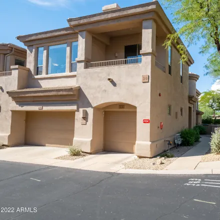 Buy this 2 bed townhouse on North Thompson Peak Parkway in Scottsdale, AZ 85060