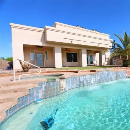 Buy this 4 bed house on 10242 South Winter Avenue in Fortuna Foothills, AZ 85365