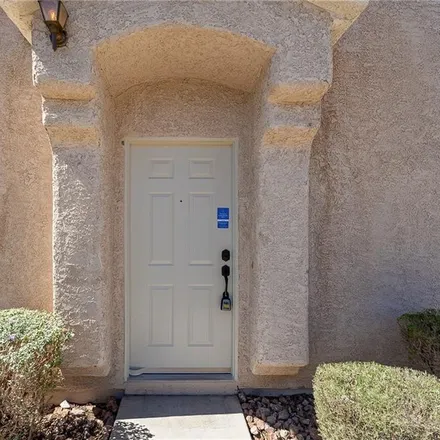 Buy this 2 bed townhouse on 6496 Rusticated Stone Avenue in Clark County, NV 89011