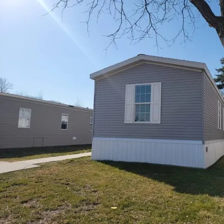 Buy this studio apartment on 38053 Saint Tropez Drive in Clinton Township, MI 48038