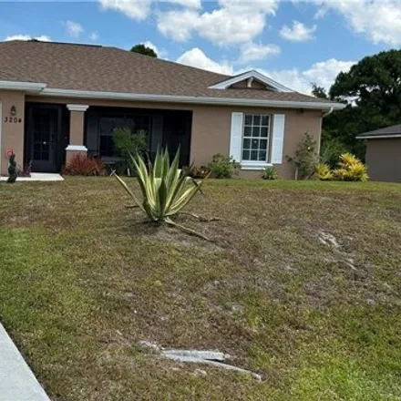 Rent this 3 bed house on 3204 31st Street West in Lehigh Acres, FL 33971