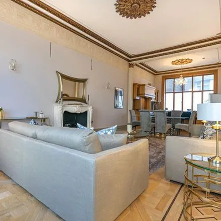 Rent this 4 bed apartment on Pembridge Hall in 28-32 Pembridge Gardens, London