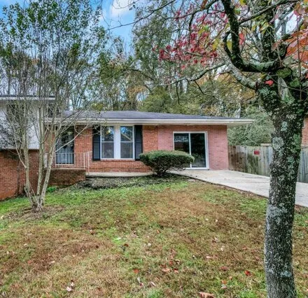 Rent this 3 bed house on 927 Slash Pine Rd Unit 1 in Forest Park, Georgia