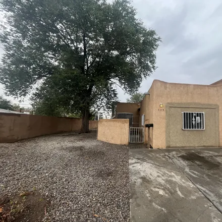 Buy this 3 bed townhouse on 545 Alcazar Street Southeast in Albuquerque, NM 87108