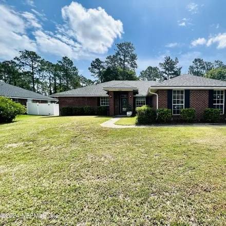 Rent this 4 bed house on McGirts Creek Drive East in Jacksonville, FL 32221