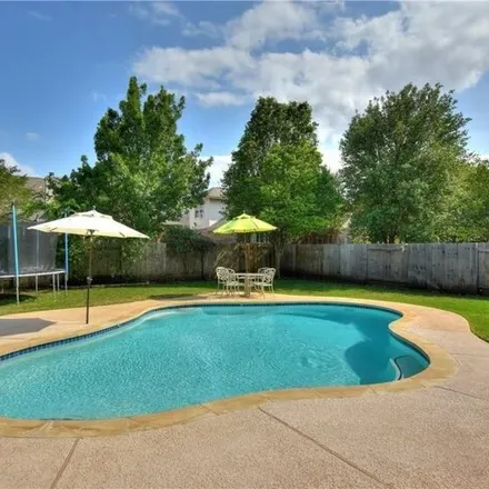 Buy this 4 bed house on 15521 Whistling Straits Drive in Austin, TX 78717