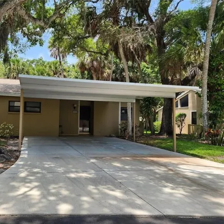 Rent this 2 bed condo on 5049 Village Gardens Drive in Sarasota, FL 34234