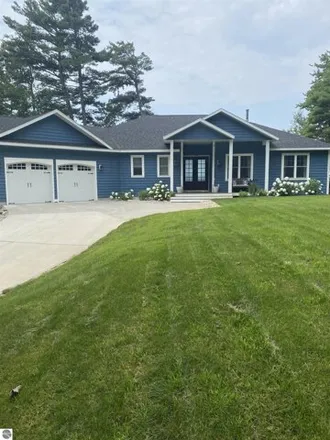 Buy this 5 bed house on 5910 Mackenzie Drive in Milton Township, MI 49648