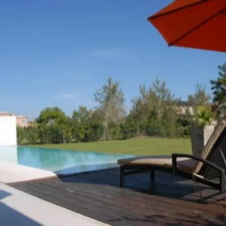 Rent this 4 bed house on Calle de los Camalotes in Partido de Tigre, 1670 Nordelta