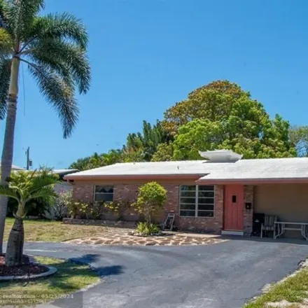 Buy this 3 bed house on 2636 Northeast 19th Street in Country Club Isles, Pompano Beach