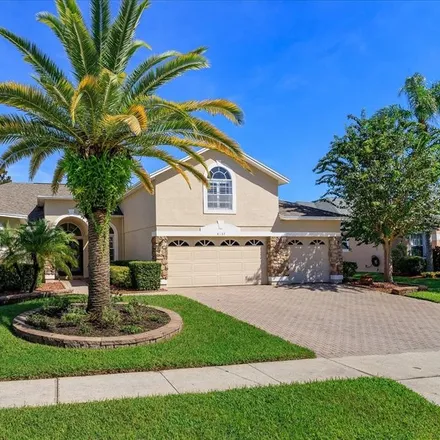 Buy this 5 bed house on 8699 Dover Oaks Court in Dr. Phillips, FL 32836