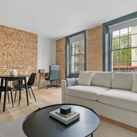 Rent this 2 bed townhouse on 12 Norfolk Place in London, W2 1QL