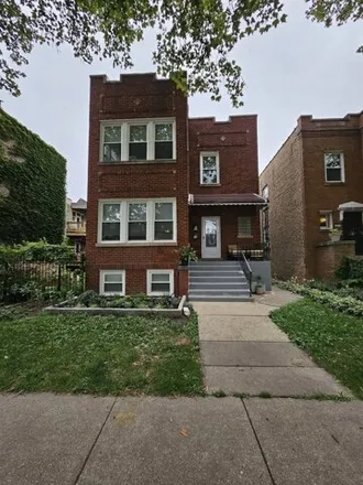 Rent this 2 bed house on 2906 N Harding Ave Unit 2 in Chicago, Illinois