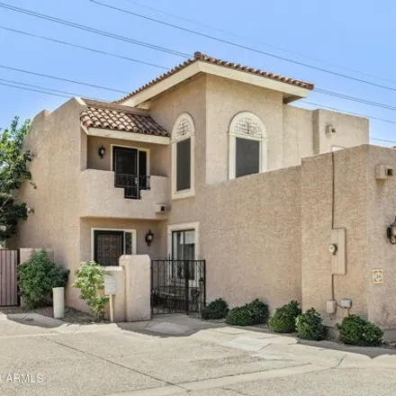 Buy this 2 bed townhouse on North 12th Street in Phoenix, AZ 85012