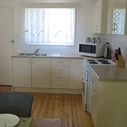 Rent this 4 bed house on Picnic Bay in Townsville City, Queensland