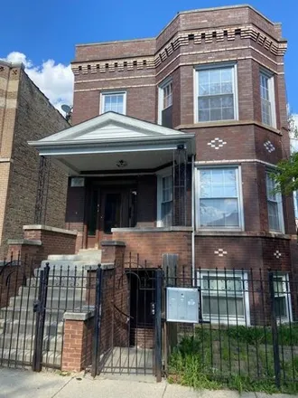 Buy this 8 bed house on 1429 North Avers Avenue in Chicago, IL 60651