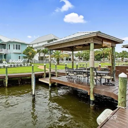 Buy this 4 bed house on 28598 Burkart Drive in Caswell, Orange Beach