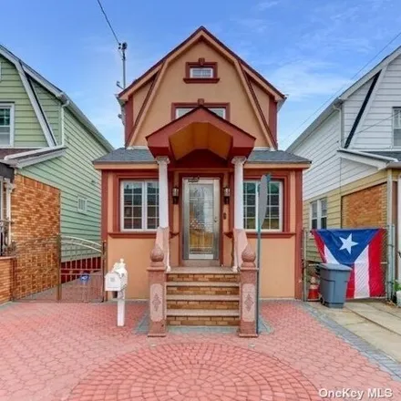 Buy this 3 bed house on 130-10 121st Street in New York, NY 11420