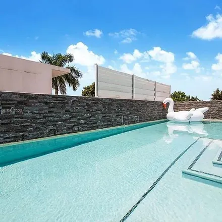 Rent this 4 bed apartment on 1701 Southwest 4th Avenue in The Roads, Miami