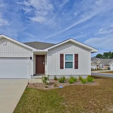Rent this 3 bed house on Monarch Lane in Brent, FL 32505