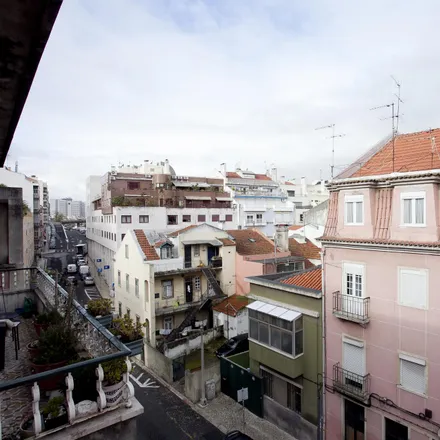 Rent this 5 bed room on Rua da Beneficência in Rua Carlos Reis, 1600-093 Lisbon
