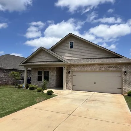 Rent this 4 bed house on Caden Court in Triana, AL