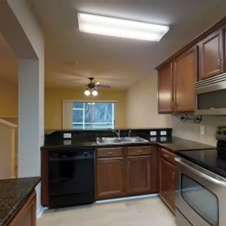 Rent this 2 bed apartment on 15774 Fishhawk Falls Drive in Fishhawk Ridge, Lithia