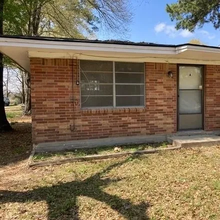 Rent this 2 bed house on 168 Moffett Springs Road in Huntsville, TX 77320