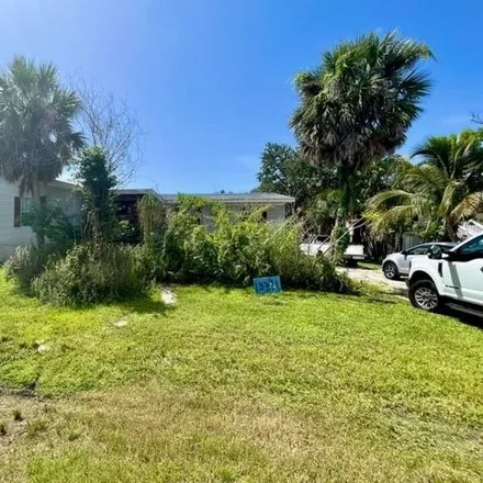 Buy this 4 bed house on 13245 Electron Drive in Iona, FL 33908