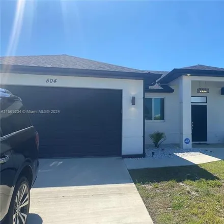 Rent this 3 bed house on Juanita Place in Cape Coral, FL 33915