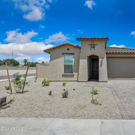 Rent this 3 bed house on 24256 West Hess Avenue in Buckeye, AZ 85326