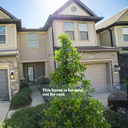 Buy this 3 bed townhouse on 14320 Dovewind Court in Jacksonville, FL 32258