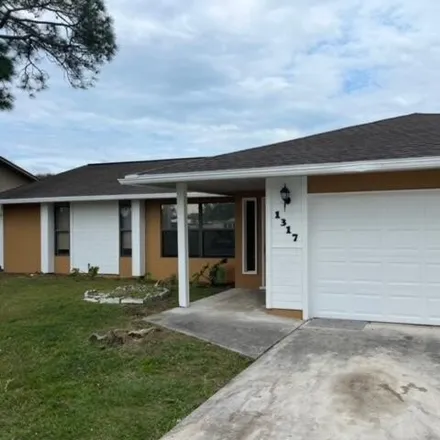 Buy this 3 bed house on 1315 Southeast Floresta Drive in Port Saint Lucie, FL 34983