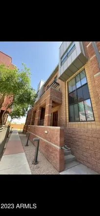 Rent this 3 bed townhouse on 302 South Farmer Avenue in Tempe, AZ 85281