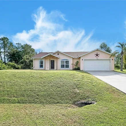 Buy this 3 bed house on 1908 Wells Avenue in Lehigh Acres, FL 33972