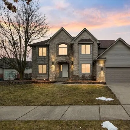 Buy this 4 bed house on 47669 Beacon Square Drive in Macomb Township, MI 48044