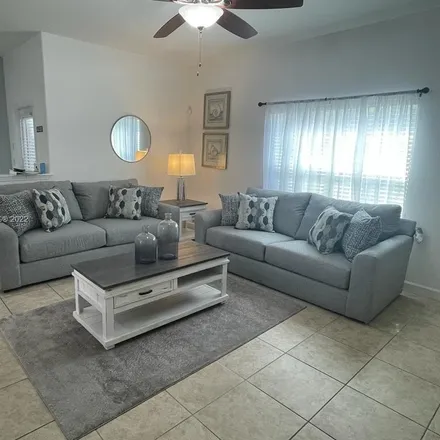 Rent this 5 bed townhouse on 8946 Cat Palm Road in Osceola County, FL 34747