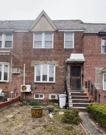 Buy this 3 bed house on 73-35 52nd Drive in New York, NY 11378