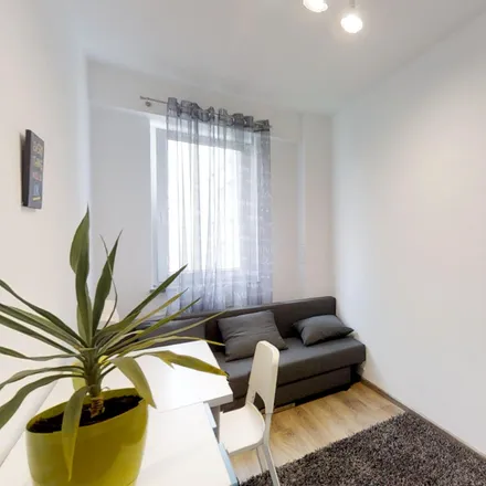 Rent this 5 bed room on Żelazna 82/84 in 00-894 Warsaw, Poland