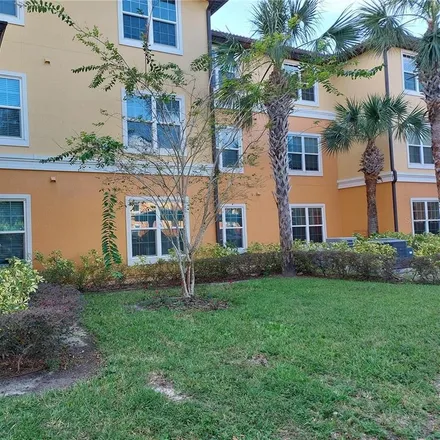 Buy this 2 bed condo on 5463 Vineland Road in Orlando, FL 32811