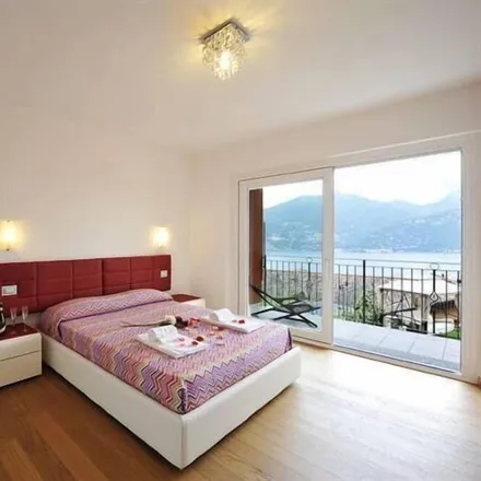 Rent this 4 bed house on Menaggio in Via Quattro Novembre, 22017 Loveno CO