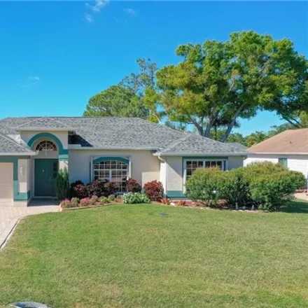 Buy this 4 bed house on 9991 Country Oaks Drive in Estero Oaks, Lee County