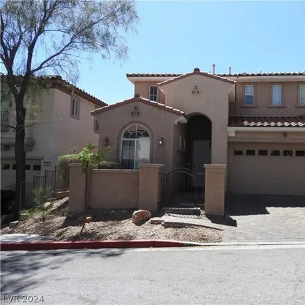 Rent this 3 bed house on 2201 Tiulip Tree Street in Summerlin South, NV 89135