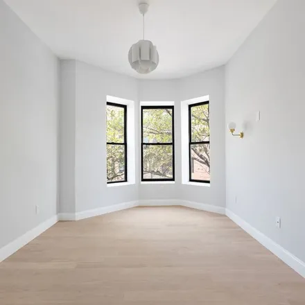 Rent this 2 bed townhouse on 132 Clifton Place in New York, NY 11238