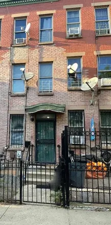 Buy this 4 bed house on 237 Hart Street in New York, NY 11206