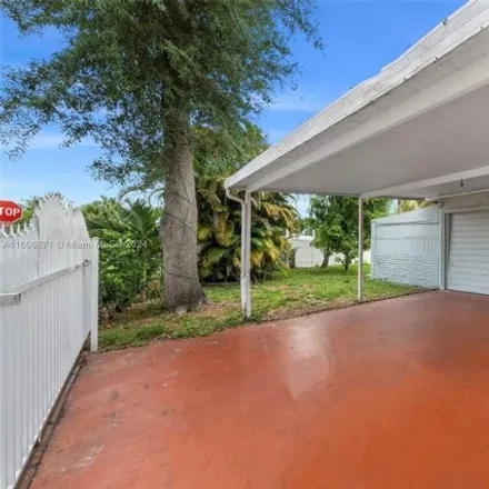 Buy this 4 bed house on 14621 NW 3rd Ave in Miami, Florida