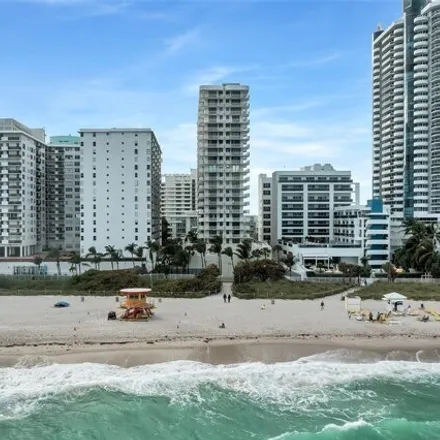 Rent this 2 bed condo on Le Trianon Condominium Association in 6061 Collins Avenue, Miami Beach