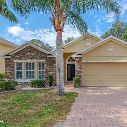 Rent this 4 bed house on 3850 Sunset Cove Drive in Port Orange, FL 32129