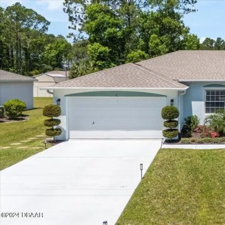 Buy this 3 bed house on 23 Powder Lane in Palm Coast, FL 32164